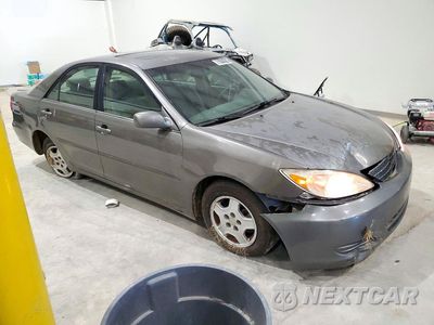 Czwarte zdjęcie samochodu z boku: 2002 TOYOTA CAMRY LE V6 VIN:4T1BF32K32U536388 - miniatura