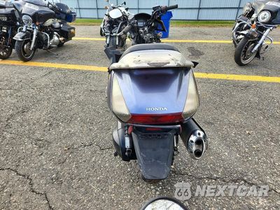 Czwarte zdjęcie samochodu z boku: 2007 HONDA FSC600 D VIN:JH2PF01117K500324 - miniatura