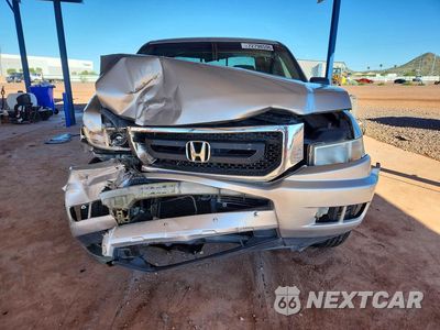 Piąte zdjęcie samochodu w środku: 2011 HONDA RIDGELINE RT VIN:5FPYK1F29BB001560 - miniatura