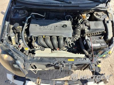 Zdjęcie 12 z 14 samochodu: 2005 TOYOTA COROLLA CE VIN:1NXBR32E85Z464271 - miniatura