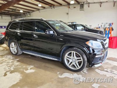 Czwarte zdjęcie samochodu z boku: 2014 MERCEDES-BENZ GL 550 4MATIC VIN:4JGDF7DE9EA302270 - miniatura