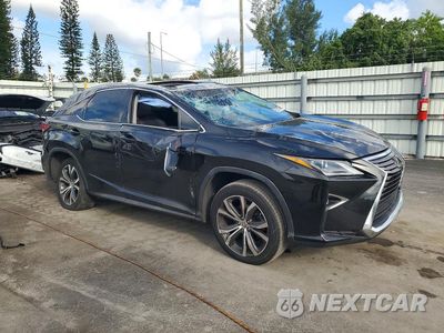 Czwarte zdjęcie samochodu z boku: 2017 LEXUS RX 350 BASE VIN:2T2ZZMCA9HC079884 - miniatura