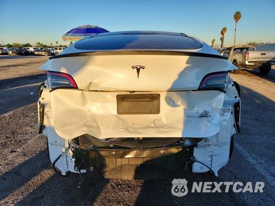 Zdjęcie 6 z 13 samochodu: 2022 TESLA MODEL Y VIN:7SAYGDEF7NF488622 - miniatura