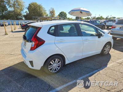 Trzecie zdjęcie samochodu z tyłu: 2016 HONDA FIT LX VIN:JHMGK5H51GX011420 - miniatura