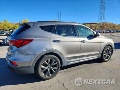 Trzecie zdjęcie samochodu z tyłu: 2018 HYUNDAI SANTA FE SPORT 2.0T ULTIMATE VIN:5XYZWDLA4JG536883 - miniatura