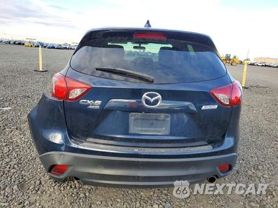 Zdjęcie 6 z 13 samochodu: 2014 MAZDA CX-5 TOURING VIN:JM3KE4CY4E0423908 - miniatura