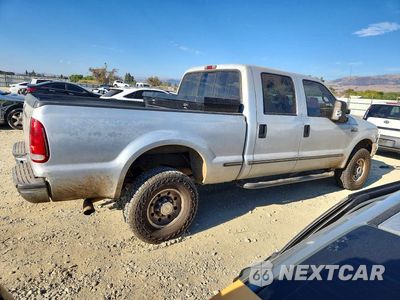 Trzecie zdjęcie samochodu z tyłu: 1999 FORD F250 SUPER DUTY VIN:1FTNW21F2XEA38233 - miniatura