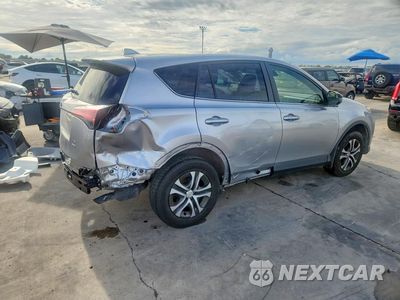 Trzecie zdjęcie samochodu z tyłu: 2018 TOYOTA RAV4 LE VIN:JTMBFREV2JJ257737 - miniatura