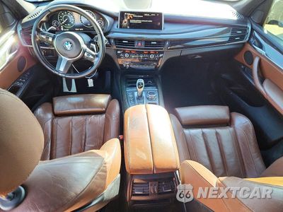 Zdjęcie 8 z 12 samochodu: 2014 BMW X5 SDRIVE35I VIN:5UXKR2C57E0H33043 - miniatura