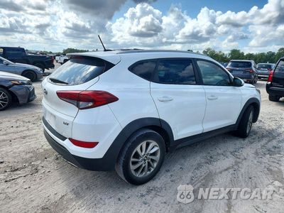 Trzecie zdjęcie samochodu z tyłu: 2016 HYUNDAI TUCSON ECO VIN:KM8J33A24GU240373 - miniatura