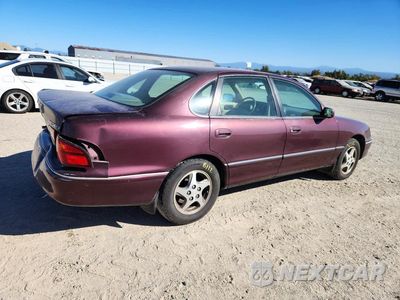 Trzecie zdjęcie samochodu z tyłu: 1999 TOYOTA AVALON XLS VIN:4T1BF18B5XU341010 - miniatura