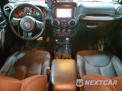 Zdjęcie 8 z 12 samochodu: 2015 JEEP WRANGLER UNLIMITED SPORT VIN:1C4BJWDG1FL761014 - miniatura