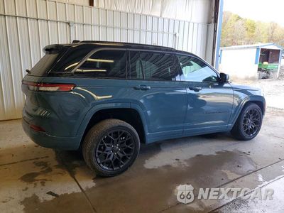 Trzecie zdjęcie samochodu z tyłu: 2026 JEEP GRAND CHEROKEE SUMMIT VIN:1C4RJHER6T8600439 - miniatura