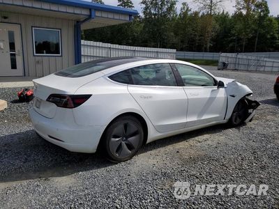 Trzecie zdjęcie samochodu z tyłu: 2018 TESLA MODEL 3 VIN:5YJ3E1EA1JF161692 - miniatura
