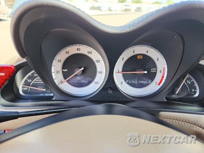Zdjęcie 9 z 13 samochodu: 2003 MERCEDES-BENZ SL 500R VIN:WDBSK75F73F040553 - miniatura