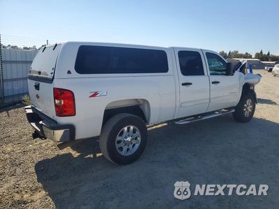 Trzecie zdjęcie samochodu z tyłu: 2014 CHEVROLET SILVERADO K2500 HEAVY DUTY LT VIN:1GC1KXCG0EF118683 - miniatura