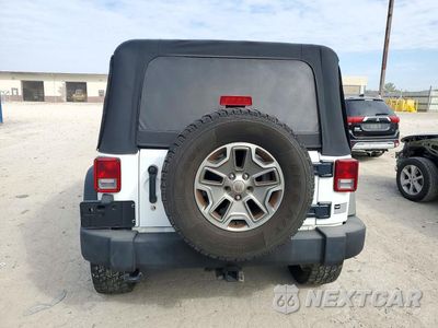 Zdjęcie 6 z 13 samochodu: 2014 JEEP WRANGLER UNLIMITED RUBICON VIN:1C4BJWFG4EL120032 - miniatura