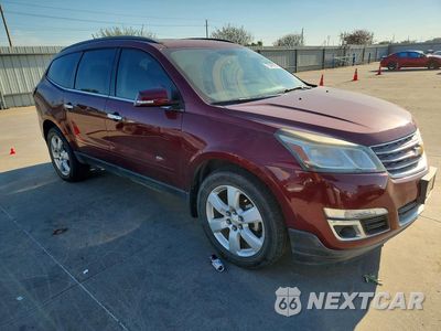 Czwarte zdjęcie samochodu z boku: 2016 CHEVROLET TRAVERSE LT VIN:1GNKRGKD8GJ177592 - miniatura