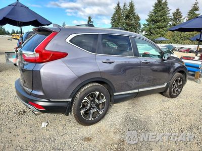 Trzecie zdjęcie samochodu z tyłu: 2017 HONDA CR-V TOURING VIN:2HKRW2H91HH612484 - miniatura