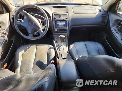 Zdjęcie 8 z 13 samochodu: 2000 NISSAN MAXIMA GXE VIN:JN1CA31A4YT023071 - miniatura