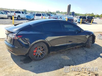 Trzecie zdjęcie samochodu z tyłu: 2022 TESLA MODEL 3 VIN:5YJ3E1EAXNF369592 - miniatura