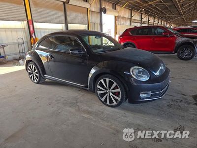 Czwarte zdjęcie samochodu z boku: 2012 VOLKSWAGEN BEETLE TURBO VIN:3VWVA7AT9CM642686 - miniatura