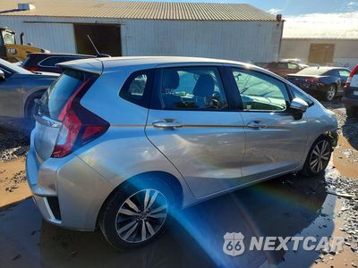 Trzecie zdjęcie samochodu z tyłu: 2016 HONDA FIT EX VIN:3HGGK5H98GM703394 - miniatura