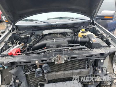 Zdjęcie 11 z 12 samochodu: 2014 FORD F150 SUPERCREW VIN:1FTFW1ET2EFA76082 - miniatura
