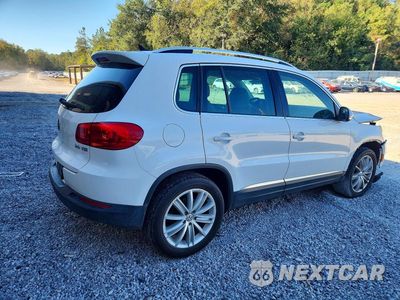 Trzecie zdjęcie samochodu z tyłu: 2014 VOLKSWAGEN TIGUAN S VIN:WVGAV3AXXEW512920 - miniatura