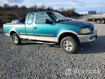 Czwarte zdjęcie samochodu z boku: 1997 FORD F150 VIN:1FTEX18LXVKC11630 - miniatura