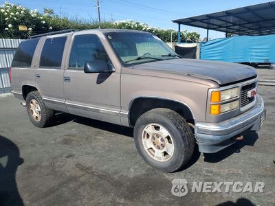 Czwarte zdjęcie samochodu z boku: 1997 GMC YUKON VIN:1GKEK13R4VJ737496 - miniatura