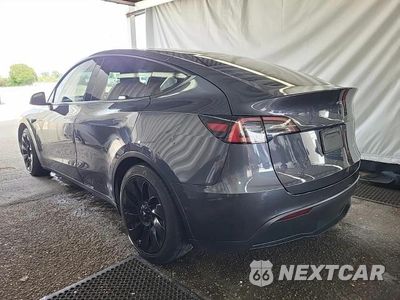 Trzecie zdjęcie samochodu z tyłu: 2022 TESLA MODEL Y VIN:7SAYGDEE1NF387017 - miniatura