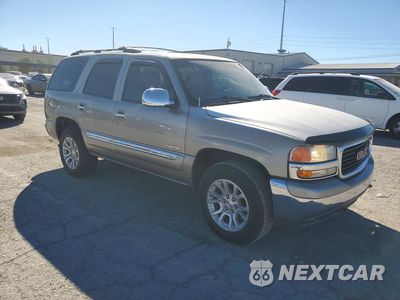Czwarte zdjęcie samochodu z boku: 2000 GMC YUKON VIN:1GKEK13V6YJ181645 - miniatura