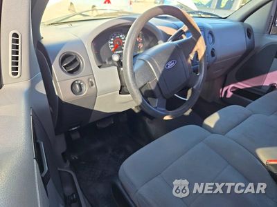 Zdjęcie 8 z 12 samochodu: 2007 FORD F150 VIN:1FTRF12207NA15556 - miniatura
