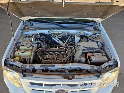 Zdjęcie 12 z 13 samochodu: 2009 FORD ESCAPE HYBRID VIN:1FMCU49339KA70045 - miniatura