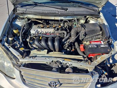 Zdjęcie 11 z 12 samochodu: 2003 TOYOTA COROLLA CE VIN:JTDBR32E232009901 - miniatura