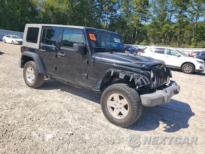 Czwarte zdjęcie samochodu z boku: 2014 JEEP WRANGLER UNLIMITED RUBICON VIN:1C4HJWFG1EL220681 - miniatura