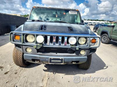 Piąte zdjęcie samochodu w środku: 2003 HUMMER H2 VIN:5GRGN23UX3H101352 - miniatura