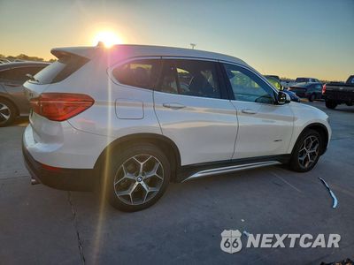 Trzecie zdjęcie samochodu z tyłu: 2017 BMW X1 XDRIVE28I VIN:WBXHT3C36H5F77220 - miniatura