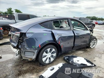 Trzecie zdjęcie samochodu z tyłu: 2022 TESLA MODEL Y VIN:7SAYGDEEXNF320433 - miniatura