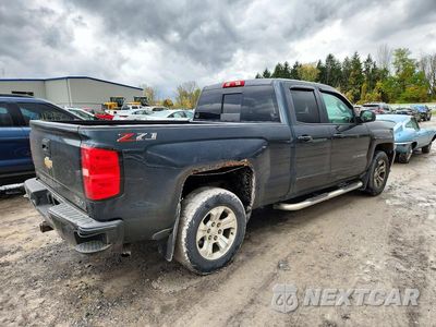 Trzecie zdjęcie samochodu z tyłu: 2018 CHEVROLET SILVERADO K1500 LT VIN:1GCVKRECXJZ246512 - miniatura