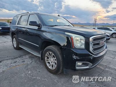 Czwarte zdjęcie samochodu z boku: 2015 GMC YUKON SLT VIN:1GKS2BKC1FR267307 - miniatura