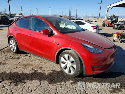 Czwarte zdjęcie samochodu z boku: 2023 TESLA MODEL Y VIN:7SAYGDEEXPA040379 - miniatura