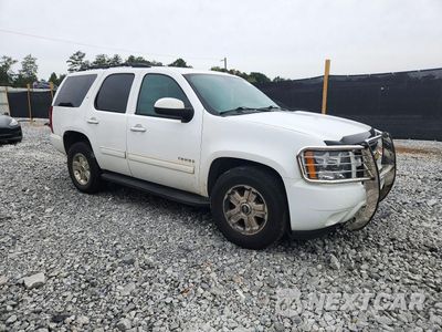 Czwarte zdjęcie samochodu z boku: 2014 CHEVROLET TAHOE C1500 LT VIN:1GNSCBE03ER226838 - miniatura