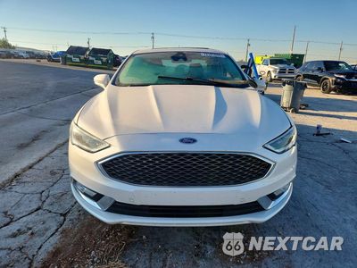 Piąte zdjęcie samochodu w środku: 2017 FORD FUSION TITANIUM HEV VIN:3FA6P0RU8HR161533 - miniatura