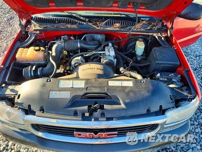 Zdjęcie 11 z 12 samochodu: 2000 GMC NEW SIERRA C1500 VIN:1GTEC14W8YZ294580 - miniatura