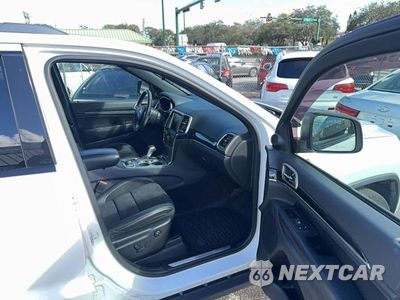Piąte zdjęcie samochodu w środku: 2017 JEEP GRAND CHEROKEE TRAILHAWK VIN:1C4RJFLT8HC610249 - miniatura
