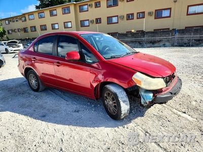 Czwarte zdjęcie samochodu z boku: 2013 SUZUKI SX4 LE VIN:JS2YC5A37D6100685 - miniatura