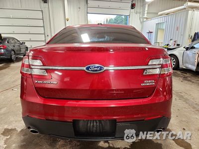 Zdjęcie 6 z 12 samochodu: 2014 FORD TAURUS SEL VIN:1FAHP2E89EG123728 - miniatura
