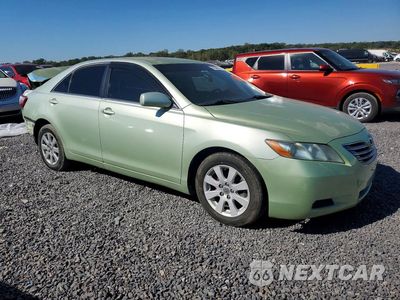 Czwarte zdjęcie samochodu z boku: 2009 TOYOTA CAMRY HYBRID VIN:4T1BB46K69U079002 - miniatura